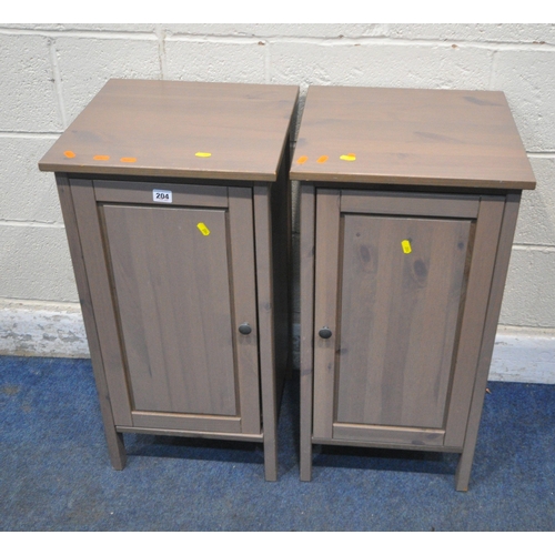 204 - AN OPPOSING PAIR OF PINE BEDSIDE CABINETS, each with a single cupboard door, 39cm squared x height 7... 