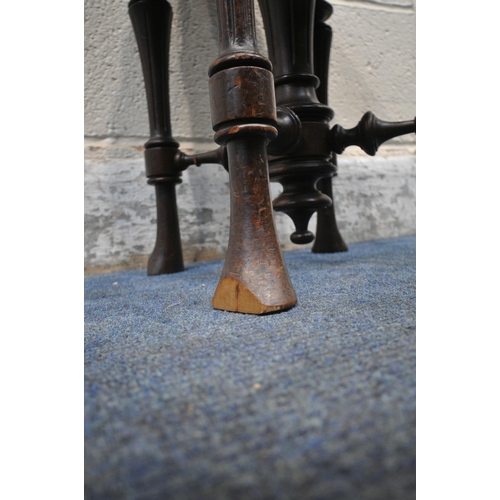 206 - A 20TH CENTURY MAHOGANY PIANO STOOL, with a rise and fall swivel seat, raised on tapered legs, unite... 