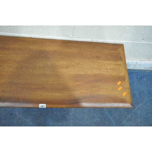 207 - A MID CENTURY TEAK RECTANGULAR COFFEE TABLE, raised on tubular metal legs, width 95cm x depth 40cm x... 