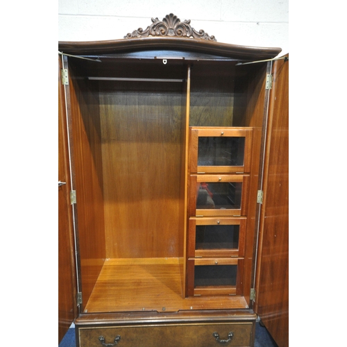 213 - TWO 20TH CENTURY QUEEN ANNE STYLE WALNUT DOUBLE DOOR WARDROBES, with foliate crests, raised on small... 