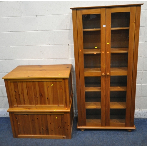 215 - THREE PIECES OF MODERN PINE FURNITURE, to include a bookcase, with two glass doors, width 87cm x dep... 