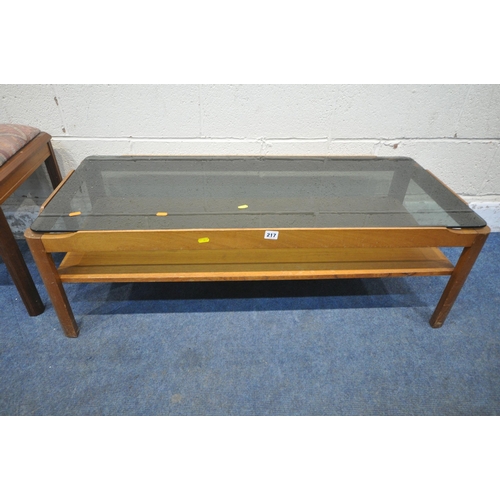 217 - A MID CENTURY MYER TEAK RECTANGULAR COFFEE TABLE, with a smoked glass insert, and an undershelf, len... 