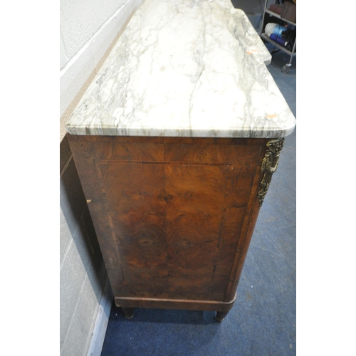 223 - A REPRODUCTION BURR WALNUT BREAKFRONT SIDEBOARD, with a marble top, three drawers, above three cupbo... 