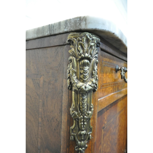 223 - A REPRODUCTION BURR WALNUT BREAKFRONT SIDEBOARD, with a marble top, three drawers, above three cupbo... 