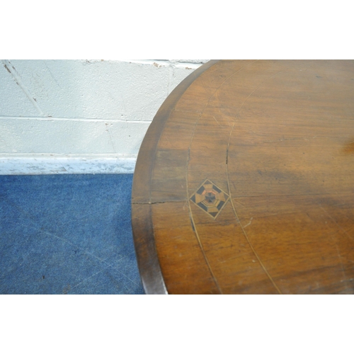 232 - A MAHOGANY OVAL TILT TOP LOO TABLE, raised on a single pedestal, with three shaped legs, length 116c... 