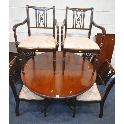 237 - A REPRODUCTION MAHOGANY DINING SUITE, comprising a single pedestal extending dining table, with one ... 