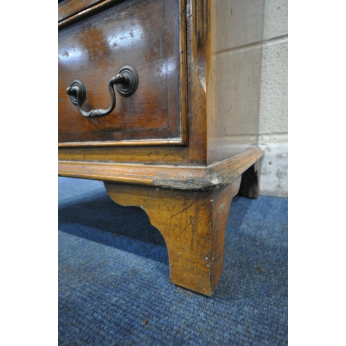 245 - A REPRODUCTION YEW WOOD TALL CHEST OF EIGHT ASSORTED DRAWERS, with a single brushing slide, raised o... 