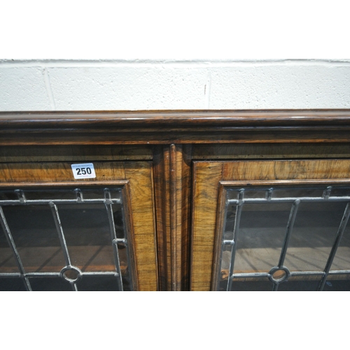 250 - A 19TH CENTURY ROSEWOOD LEAD GLAZED TWO DOOR BOOKCASE, two twin sections enclosing six adjustable sh... 