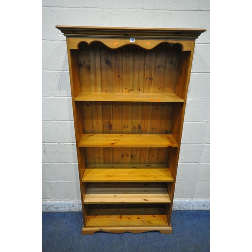 251 - A MODERN PINE OPEN BOOKCASE, width 94cm x depth 33cm x height 180cm, condition report: general signs... 