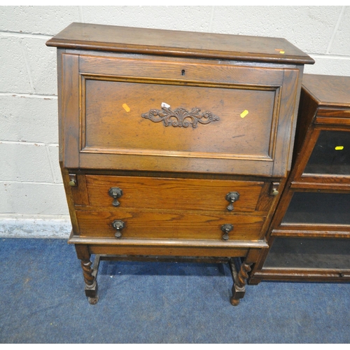 258 - A 20TH CENTURY OAK BOOKCASE, with three hide and fall glass doors, width 90cm x depth 29cm x height ... 