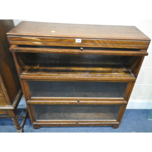 258 - A 20TH CENTURY OAK BOOKCASE, with three hide and fall glass doors, width 90cm x depth 29cm x height ... 