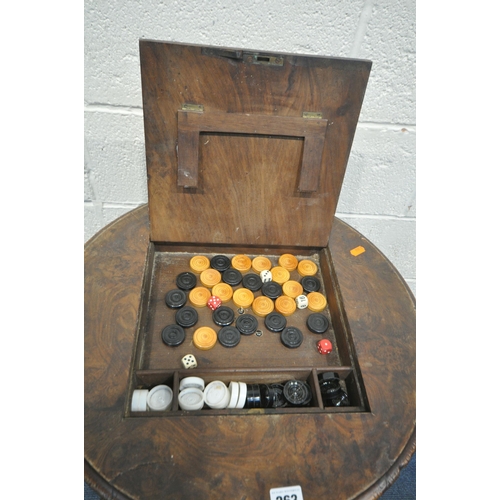 263 - A VICTORIAN BURR WALNUT CIRCULAR TRIPOD TABLE, the top surface adapted to be a chess table, with gam... 