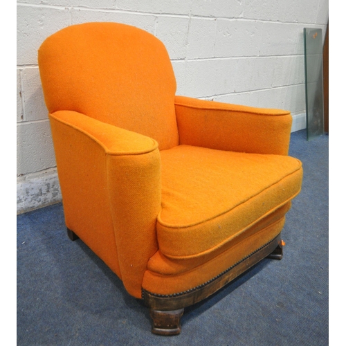 275 - A HARRIS TWEED ORANGE ARMCHAIR, raised on an oak frame, condition report: marks, stains, discolourat... 