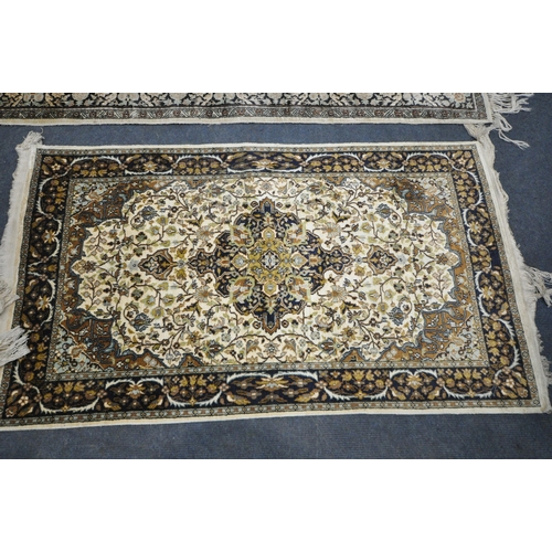 276 - A SYNTHETIC SILK RECTANGULAR RUG, with intricate patterns, and a multi-strap border, 157cm x 87cm, a... 