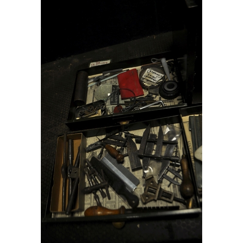 57 - A METAL FILE DRAWER, AN AMMO BOX AND A BOX CONTAINING ENGINEERING TOOLS including hammers, mallets, ... 