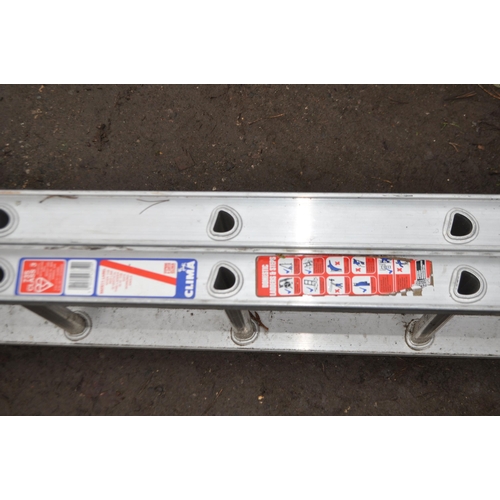 6 - AN ALUMINIUM DOUBLE EXTENSION LADDERS BY CLIMA with twelve rungs to each 350cm length