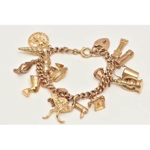 409 - A YELLOW METAL CHARM BRACELET, curb link bracelet with links stamped 9ct, fitted with a heart padloc... 