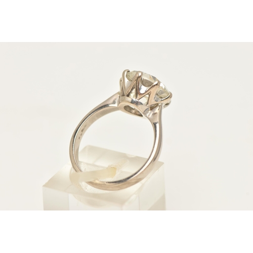 410 - A MODERN 18CT WHITE GOLD, DIAMOND SINGLE STONE RING, set with a round brilliant cut diamond, within ... 