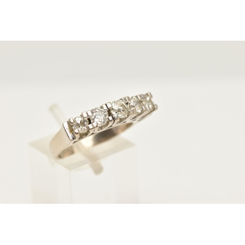 411 - A WHITE METAL FIVE STONE DIAMOND RING, designed as a row of five slightly graduating old cut diamond... 