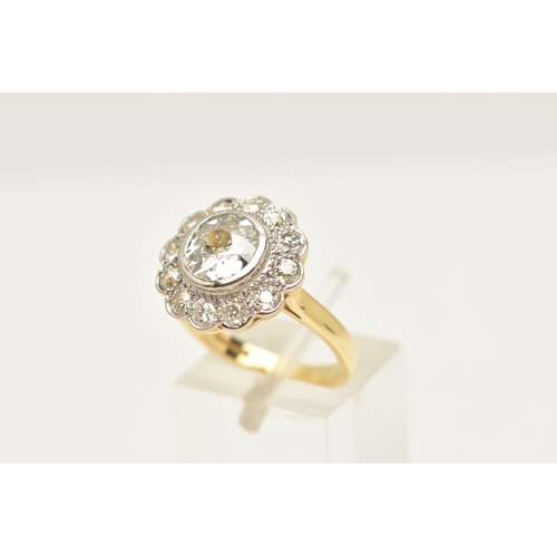 414 - AN 18CT GOLD DIAMOND CLUSTER RING, collet set with a central old cut diamond, spreads approximately ... 