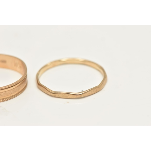 427 - THREE 9CT GOLD RINGS, to include a textured band ring, hallmarked 9ct London, ring size T, a 9ct gol... 