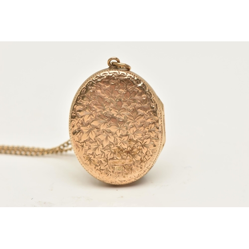 433 - A 9CT GOLD LOCKET, an oval form locket, floral and scrolling acanthus etched detail to the front wit... 