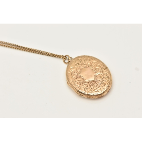 433 - A 9CT GOLD LOCKET, an oval form locket, floral and scrolling acanthus etched detail to the front wit... 