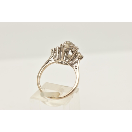 438 - AN 18CT WHITE GOLD DIAMOND CLUSTER RING, asymmetrical cluster of various sized old cut diamonds, in ... 