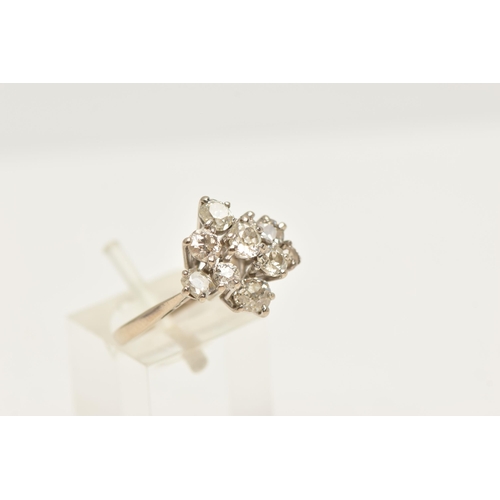 438 - AN 18CT WHITE GOLD DIAMOND CLUSTER RING, asymmetrical cluster of various sized old cut diamonds, in ... 