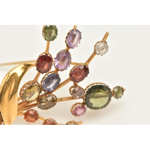 445 - A MULTI GEM SET FLORAL SPRAY BROOCH, a yellow metal brooch, prong set with assorted oval and circula... 