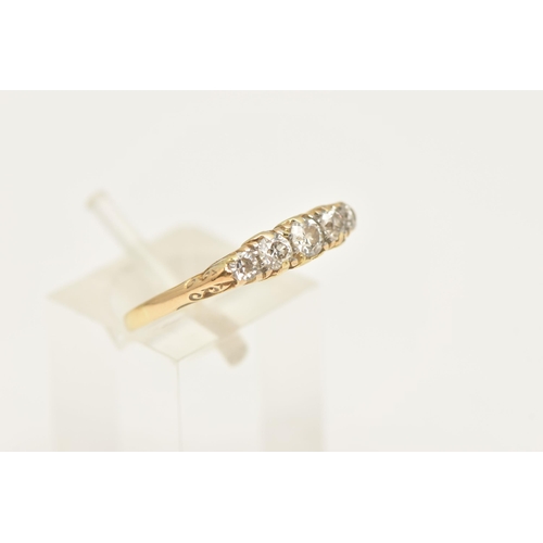 449 - AN EARLY 20TH CENTURY FIVE STONE DIAMOND RING, five old cut diamonds, prong set in yellow metal, app... 