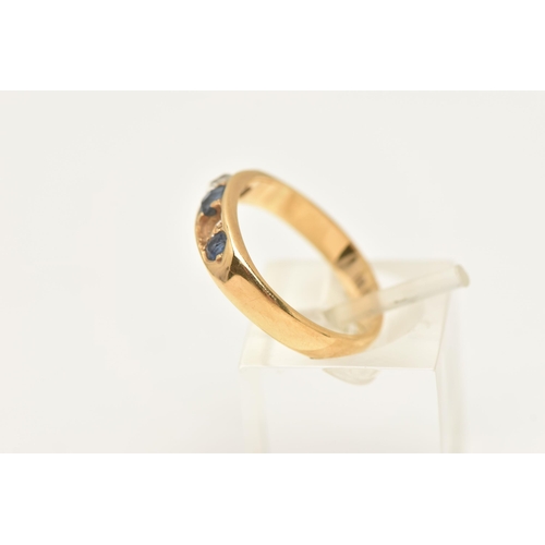 452 - AN EARLY 20TH CENTURY GEM SET BAND RING, three oval cut sapphires and one old cut diamond (one diamo... 