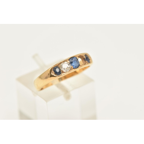 452 - AN EARLY 20TH CENTURY GEM SET BAND RING, three oval cut sapphires and one old cut diamond (one diamo... 