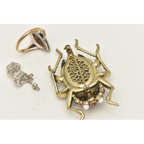 472 - THREE ITEMS OF JEWELLERY, to include a yellow and white metal marcasite set ring, stamped 9ct Silver... 