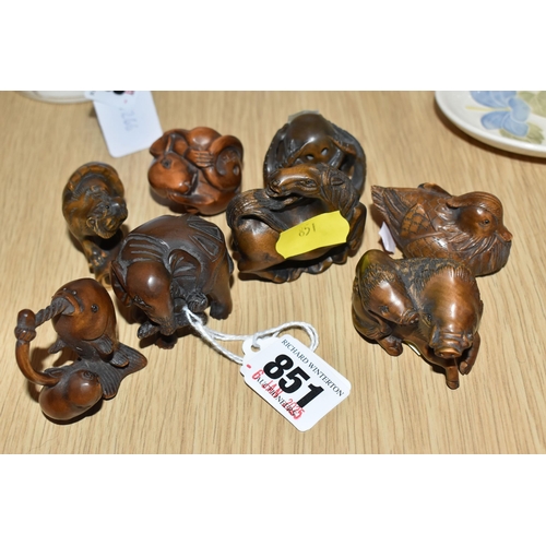 851 - A GROUP OF EIGHT WOODEN MODERN NETSUKE FIGURINES to include an octopus, a horse, a curled mouse, a p... 