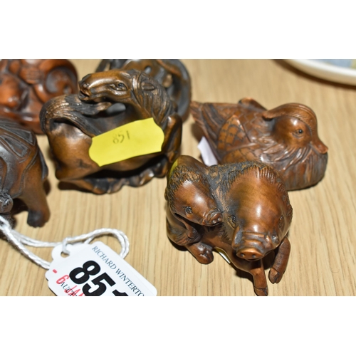 851 - A GROUP OF EIGHT WOODEN MODERN NETSUKE FIGURINES to include an octopus, a horse, a curled mouse, a p... 