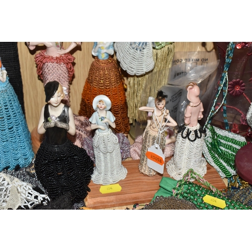 854 - A LARGE QUANTITY OF VINTAGE BEADWORK to include a large group of small beaded pouches, ten female fi... 