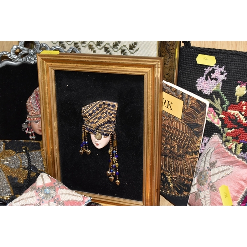 854 - A LARGE QUANTITY OF VINTAGE BEADWORK to include a large group of small beaded pouches, ten female fi... 