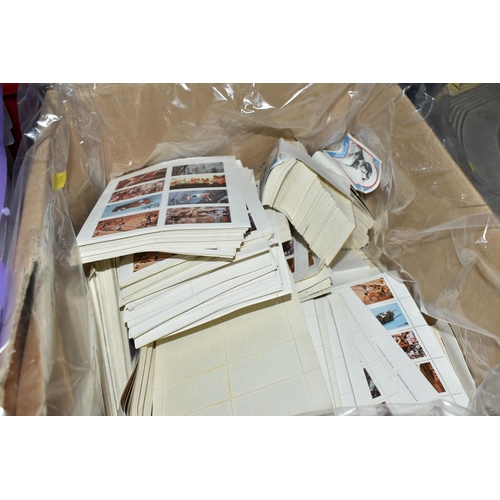 859 - FOUR BOXES OF 'CINDERELLA/LOCAL' STAMPS to include thousands of Bernera Scotland, State of Oman, Eyn... 