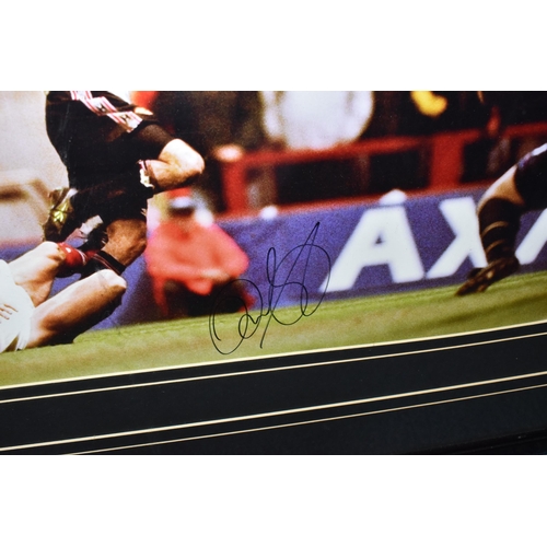 867 - FRAMED FOOTBALL MEMORABILIA OF RYAN GIGGS, a framed photograph of Ryan Giggs with black autograph, f... 