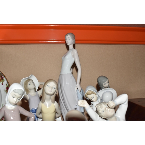 885 - A GROUP OF LLADRO FIGURES, comprising figurine 'Cocktail Party' 6655 height 42cm, 'Coy' girl with ha... 