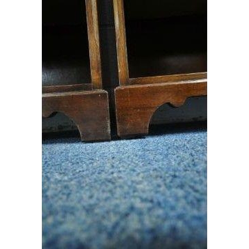 147 - A PAIR OF REPRODUX BEVAN FUNNELL MAHOGANY BEDSIDE CABINETS, with raised back and sides, fitted with ... 