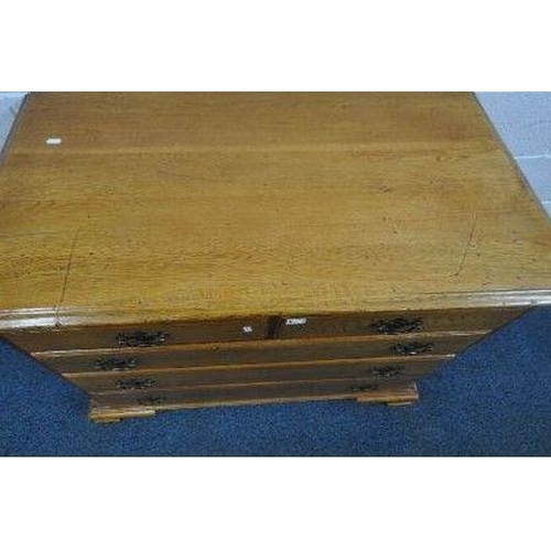 148 - A 20TH CENTURY GEORGIAN STYLE OAK CHEST OF TWO SHORT OVER THREE LONG DRAWERS, with reeded front corn... 