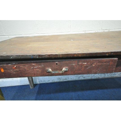 149 - AN EARLY 20TH CENTURY OAK TABLE, with a sloped top, two frieze drawers, raised on square tapered leg... 