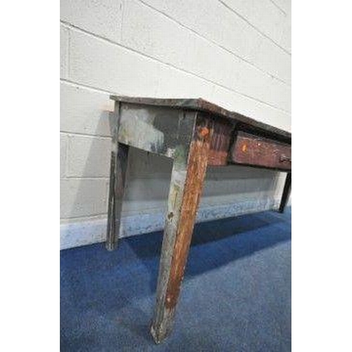 149 - AN EARLY 20TH CENTURY OAK TABLE, with a sloped top, two frieze drawers, raised on square tapered leg... 