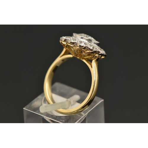 414 - AN 18CT GOLD DIAMOND CLUSTER RING, collet set with a central old cut diamond, spreads approximately ... 