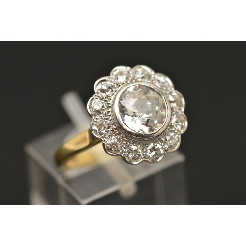 414 - AN 18CT GOLD DIAMOND CLUSTER RING, collet set with a central old cut diamond, spreads approximately ... 