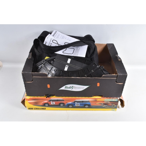 18 - A BOXED HORNBY MICRO SCALEXTRIC MINI CHALLENGE SET, with BMW Mini Coopers, with instructions, appear... 