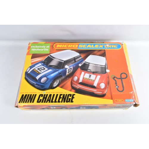 18 - A BOXED HORNBY MICRO SCALEXTRIC MINI CHALLENGE SET, with BMW Mini Coopers, with instructions, appear... 