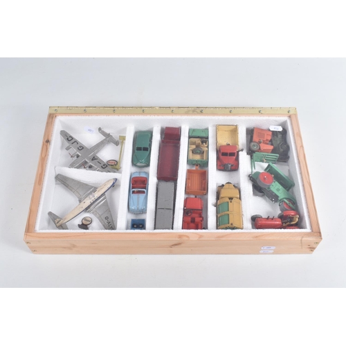 26 - A WOODEN CABINET CONTAINING A COLLECTION OF UNBOXED AND ASSORTED PLAYWORN 1950'S DINKY TOYS, to incl... 